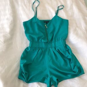 Teal lined adjustable romper.